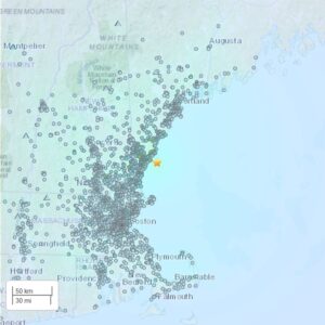 A map of the New England coast. A yellow star shows off the coast of Maine and many little dots show where people reported feeling the quake. The dots extend from north of Portland to south of Providence, RI and west of Springfield, MA.