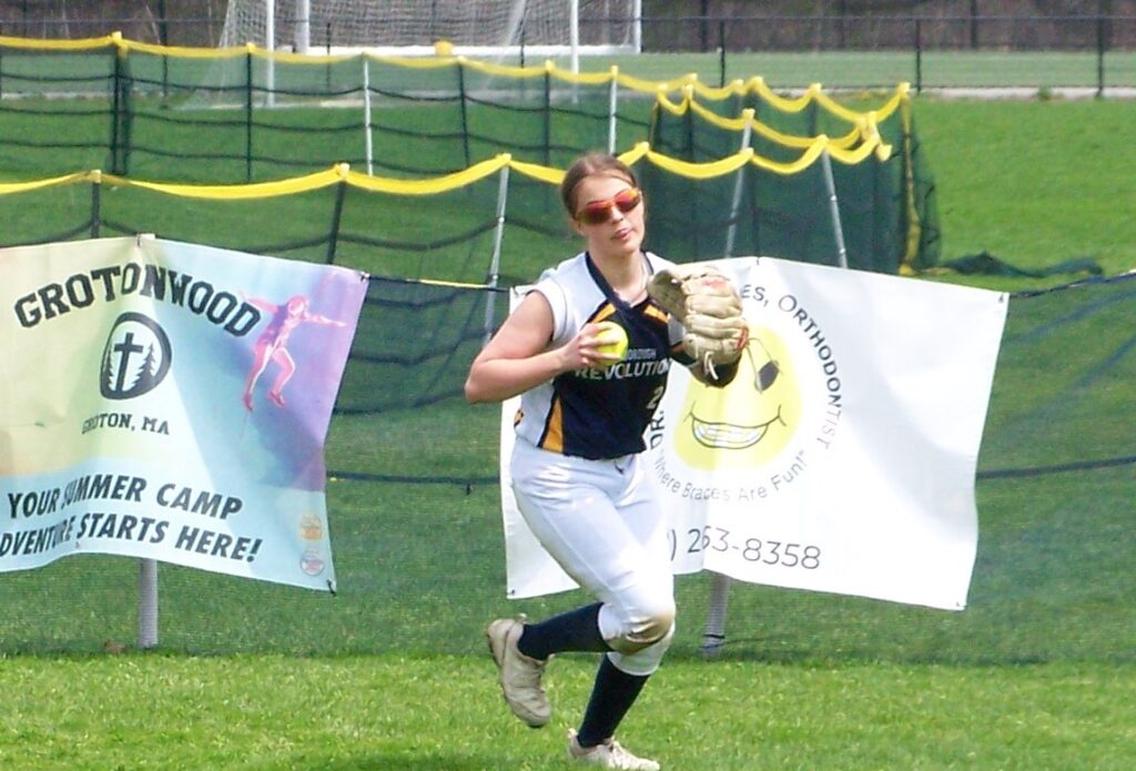 A Revs player catches the ball.