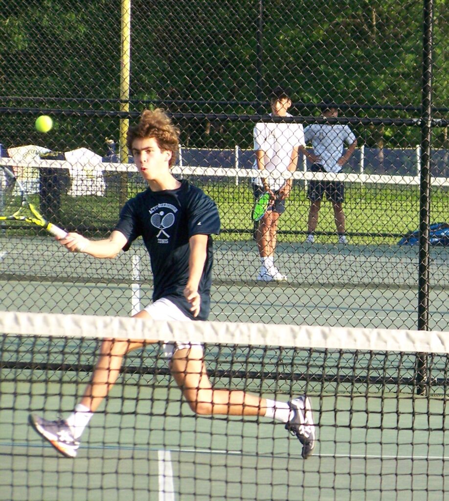 An AB player is running towards a ball. It looks like he'll get it!
