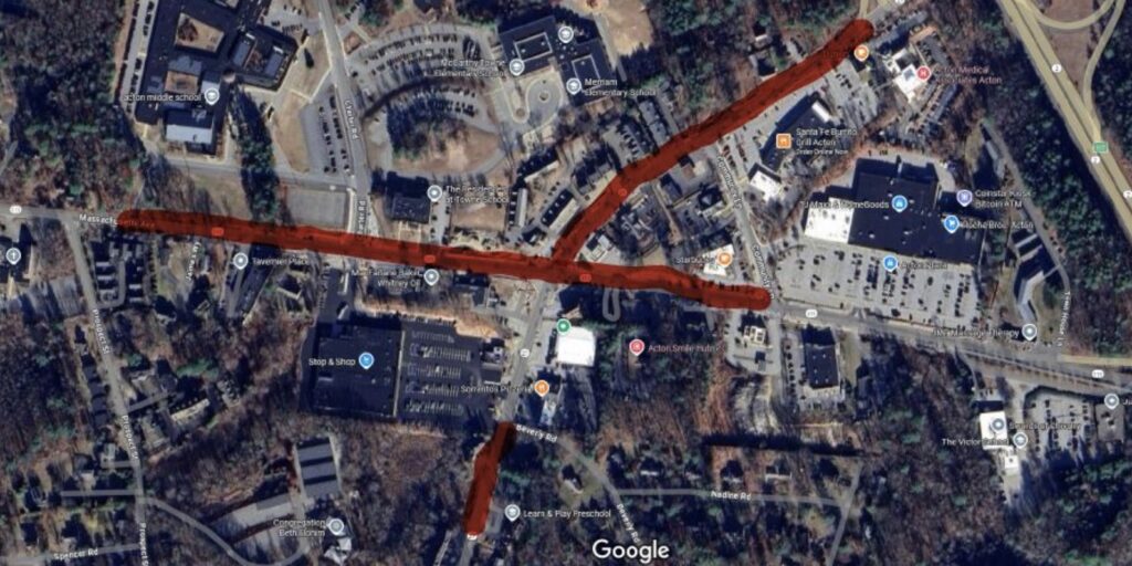 An overhead photo with two crossing red lines showing the locations on Main St. and Mass. Ave. where the overnight work will occur: Mass. Ave. between the westernmost Jr. High entrance to Community Way near Roche Bross; Main St. from the intersection north to just past Dunkin; Main St. south from Beverly Rd. to just past Learn and Play Preschool.