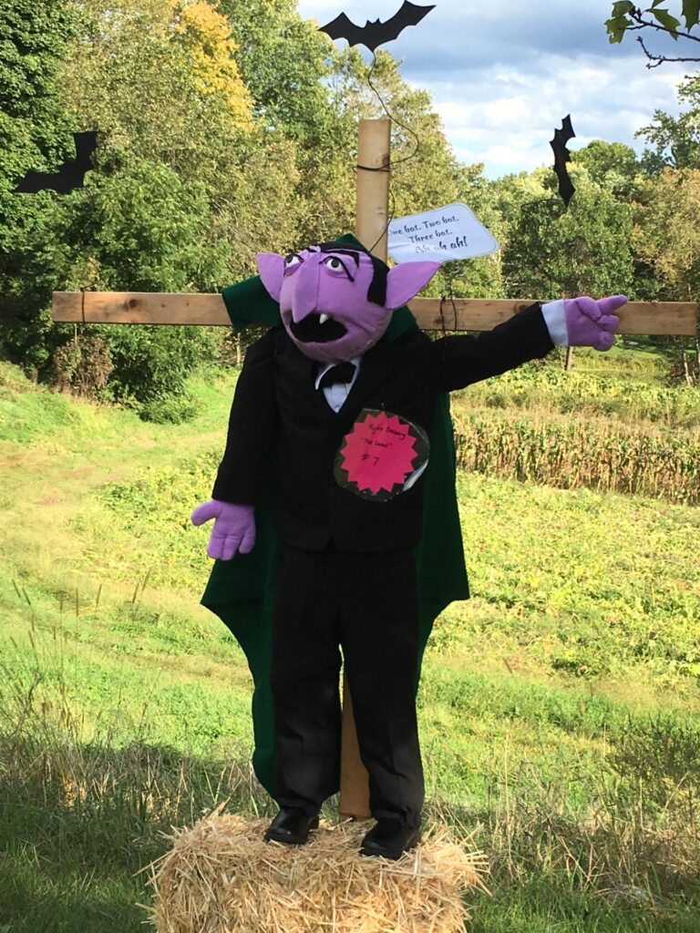 The famous purple Count from Sesame Street as a scarecrow.