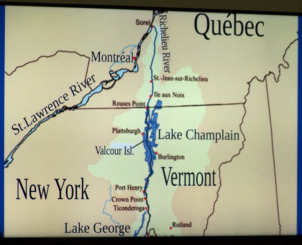A slide showing a map of northern Vermont and New York and souther Quebec.
