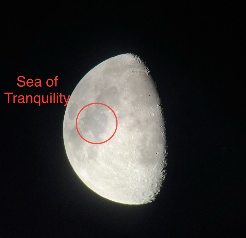 A gibbous (partial) moon. The Sea of Tranquility is highlighted in red.